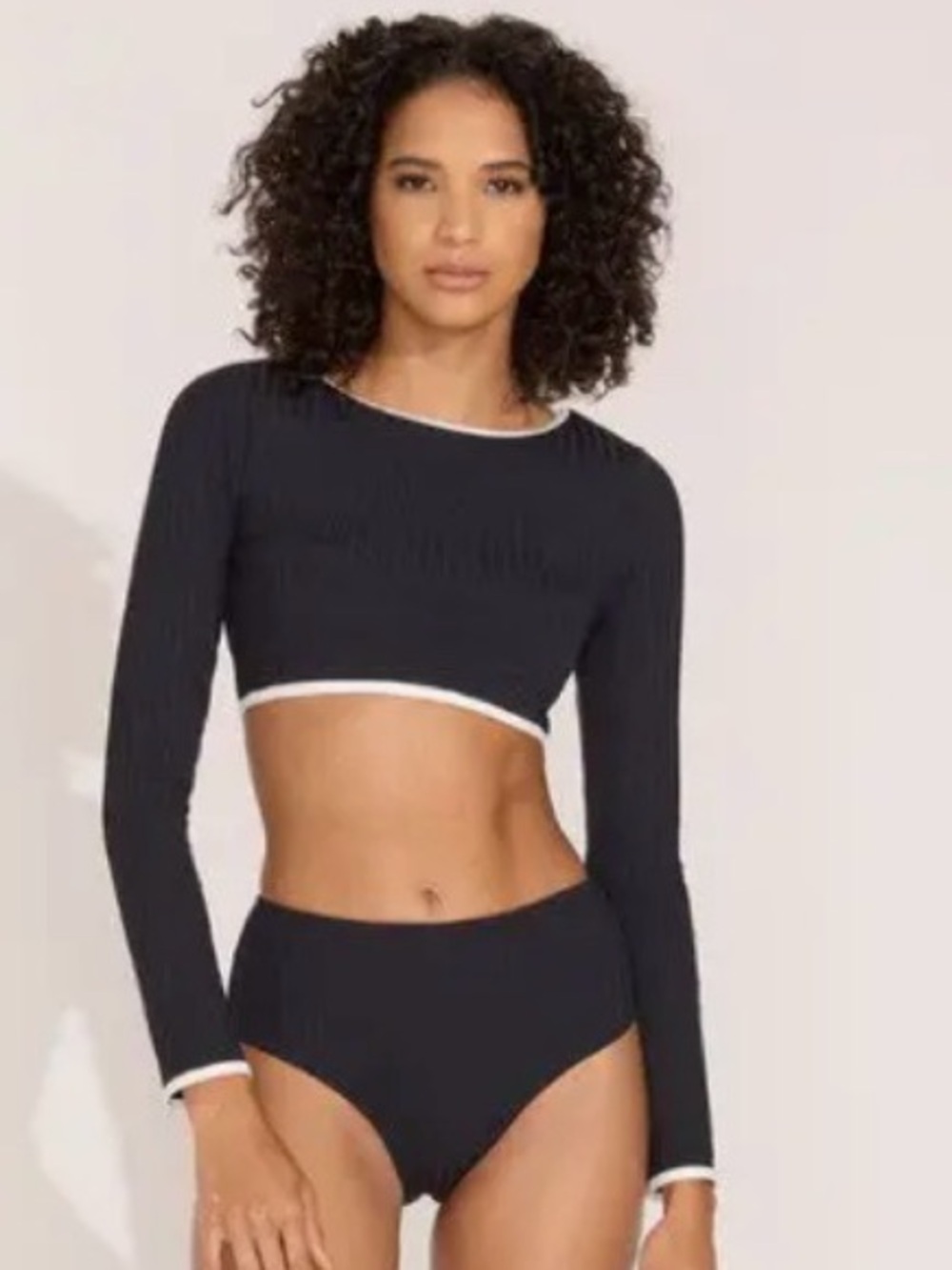 Solid & Striped Nola Rashguard in the color Blackout. Long Sleeve Crop Swim Top